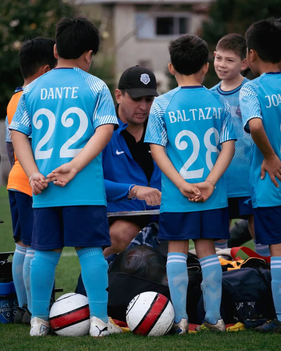 A young Patagonia FC player developing football skills